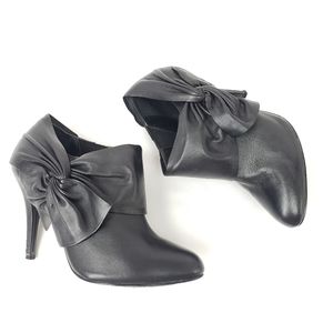 Black heel booties with bow